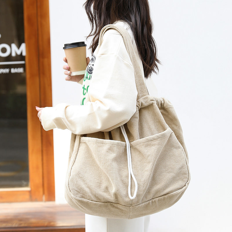 Corduroy Drawstring Multi-pocket Handbag