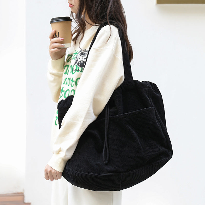 Corduroy Drawstring Multi-pocket Handbag