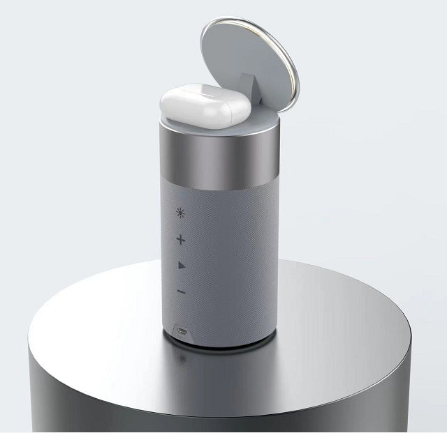 A three-in-one multi-functional iPhone and AirPods wireless charger, portable Bluetooth speaker, and touch lamp.