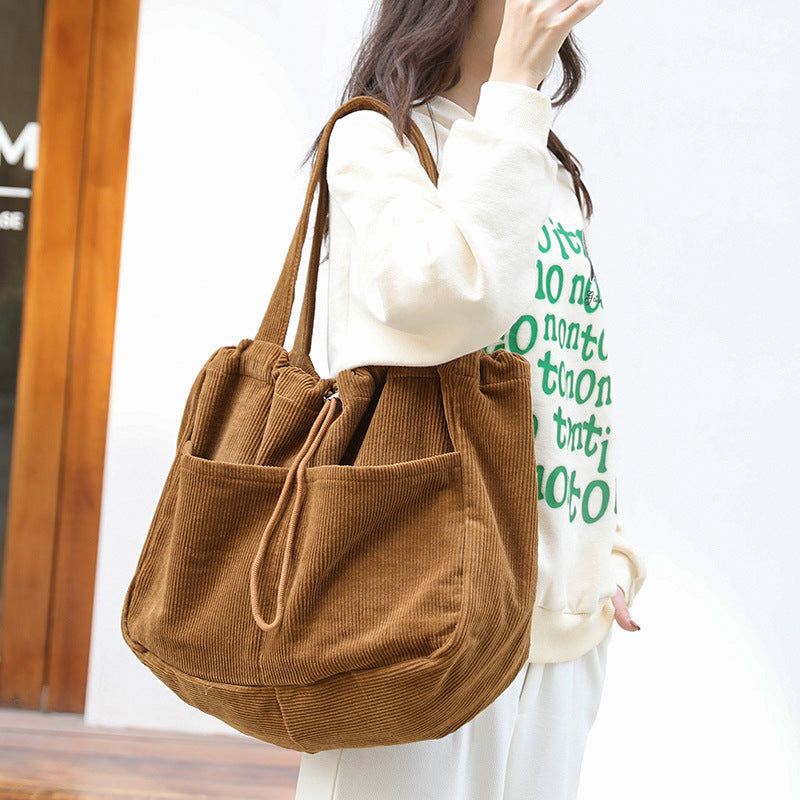 Corduroy Drawstring Multi-pocket Handbag
