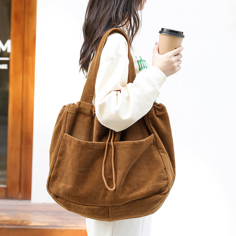 Corduroy Drawstring Multi-pocket Handbag