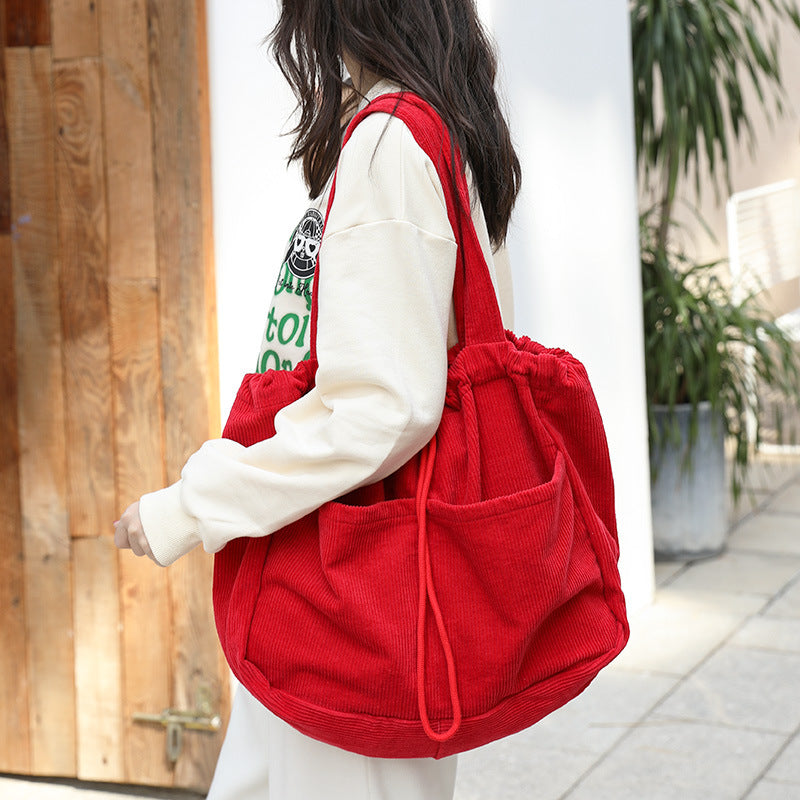 Corduroy Drawstring Multi-pocket Handbag