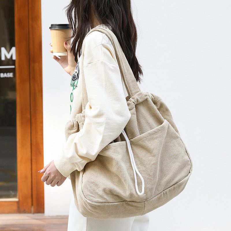 Corduroy Drawstring Multi-pocket Handbag