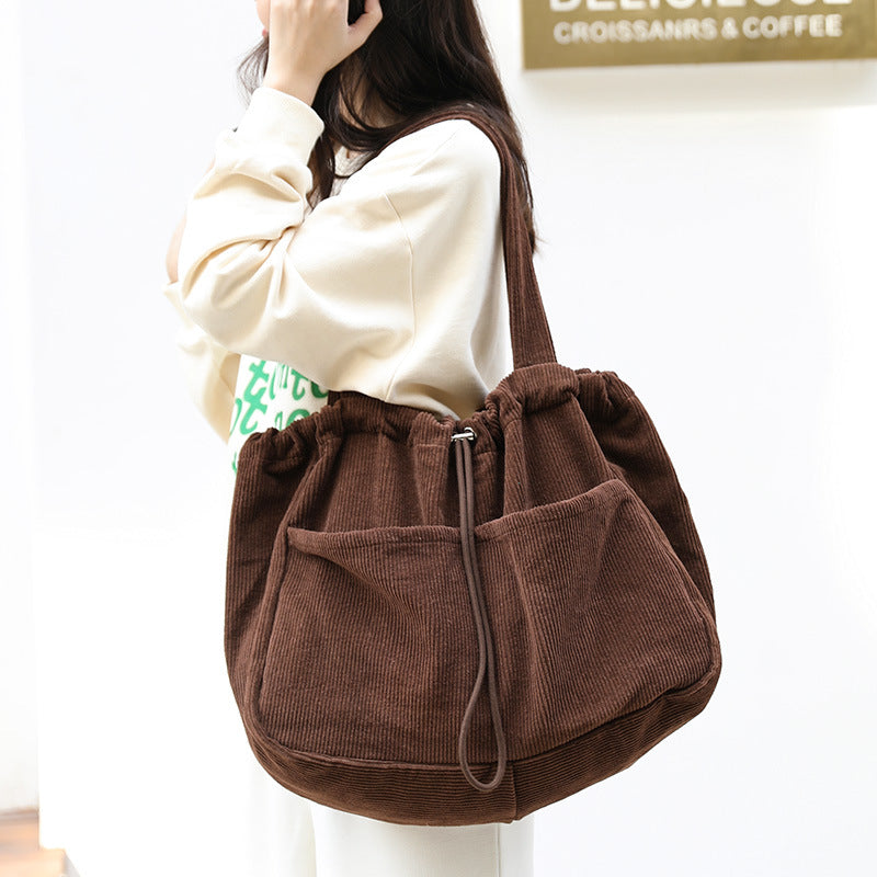 Corduroy Drawstring Multi-pocket Handbag